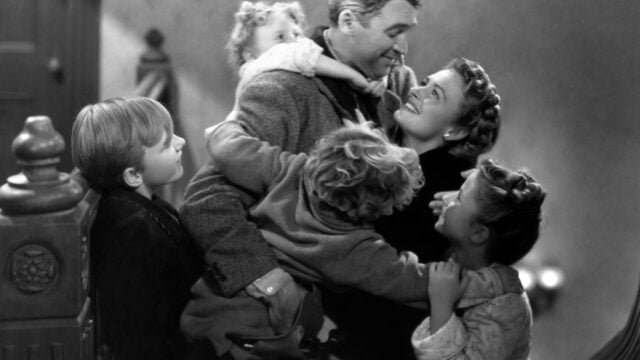 James Stewart, Donna Reed, Carol Coombs, Karolyn Grimes, Jimmy Hawkins, and Larry Simms in It's a Wonderful Life (1946)