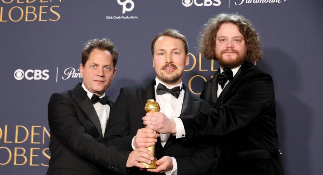 Ron Dyens, Matiss Kaza, and Gints Zilbalodis at the 82nd Golden Globe Awards